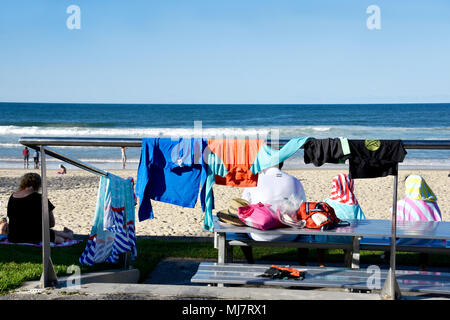 CROWDS OF PEOPLE ENJOYING BEAUTIFUL MOOLOOLABA BEACH IN QUEENSLAND AUSTRALIA Stock Photo