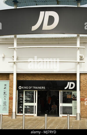 Sign above the entrance to a branch of JD sports on a retail park Stock Photo