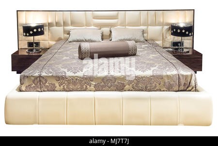 Luxury beige modern bed furniture with patterned bed with leather upholstery headboard . Soft velour fabric bedclothes. Classic modern furniture on is Stock Photo