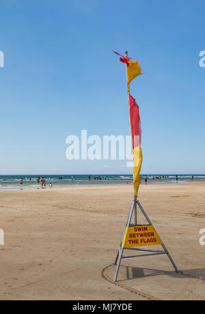 Anglesea, Australia - January 28, 2018. Swim between the flags - a common surf lifesaving sign on beaches in Australia promoting swimming safety Stock Photo