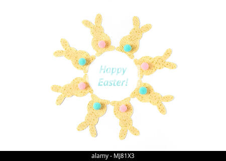 Easter bunny textured paper decorations ornament isolated on white, top view. Stock Photo