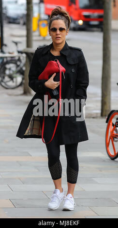 Caroline Flack heads to the gym wearing a Burberry raincoat and Ray-Ban aviator sunglasses and carrying a Gucci handbag  Featuring: Caroline Flack Where: London, United Kingdom When: 03 Apr 2018 Credit: WENN.com Stock Photo