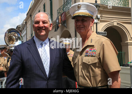 Lt. Gen. Rex C. McMillian (right), commanding general of Marine Forces Reserve and Marine Forces North, and John Bel Edwards (left), governor of Louisiana, pose for a photo following the New Orleans tricentennial ceremony in the French Quarter, New Orleans, April, 21, 2018. Service members and distinguished visitors from around the world gathered in the French Quarter to help celebrate the culture and history of New Orleans during the New Orleans Tricentennial ceremony. (U.S. Marine Corps photo by Lance Cpl. Samantha Schwoch/released) Stock Photo