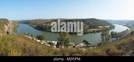 The panoramic view of bend of Guadiana river connecting southern Spain and Portugal near Pomarao. Beja. Portugal Stock Photo