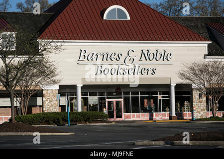 A Logo Sign Outside Of A Barnes Noble Booksellers Store In