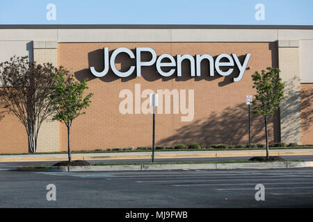 A logo sign outside of a JCPenney retail store in Annapolis, Maryland on April 29, 2018. Stock Photo