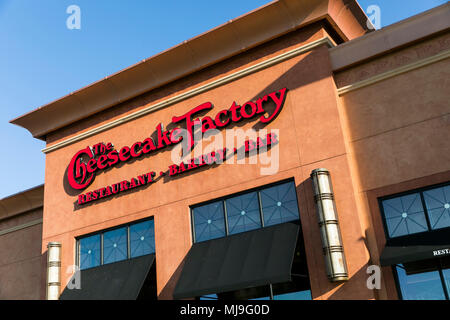 A logo sign outside of a Cheesecake Factory restaurant location in Annapolis, Maryland on April 29, 2018. Stock Photo