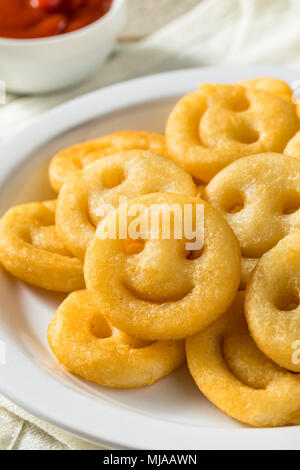 Homemade Smiley Face French Fries with Ketchup Stock Photo