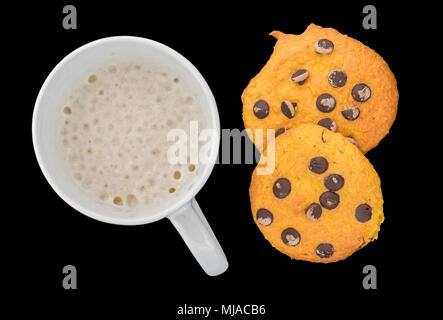 Pumpkin chocolate chip cookies with coffee for breakfast, focus on cookies Stock Photo
