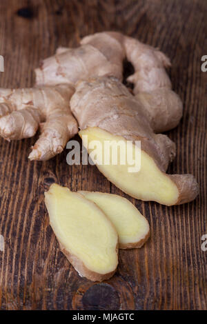 ginger on dark wood Stock Photo