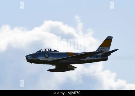 An F-86 Sabre performs a high-speed pass during Beale's Air & Space Expo Family Day at Beale Air Force Base, Calif., April 27, 2018. The Sabre, flown by Kevin Elderidge, an Air Force Heritage Flight Foundation pilot, was used during the Korean War. Stock Photo