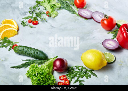 Seamless pattern with lemon, onion, tomatoes, lime and dill on white background, top view, close-up, selective focus, vertical. Vegetables abstract ba Stock Photo