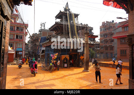 Balkumari temple and square after Thimi color festival (Sindoor Jatra), Nepali new year, april 2018 Stock Photo