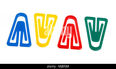 Four colorful paper clips isolated on white backgrund. Stock Photo