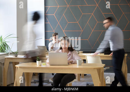 Office rush concept, employees working together in coworking usi Stock Photo