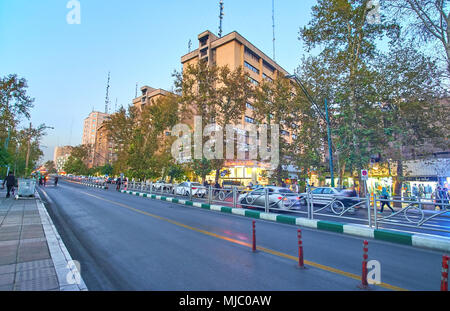 TEHRAN, IRAN - OCTOBER 25, 2017: Valiasr Avenue in Tehran is the main thoroughfare of the city with rapid bus line, on October 24 in Tehran Stock Photo