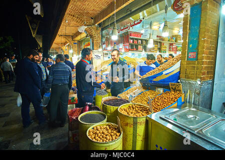 TEHRAN, IRAN - OCTOBER 25, 2017: The nuts shop is one of the most interesting stalls in Grand Bazaar with variety of nuts and other snacks and sweets, Stock Photo