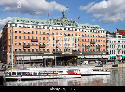 Stockholm, Sweden - March 24, 2016: Exterior of the Grand Hôtel building located at the Blaseholmen in the Stockholm city centre. In front of the hote Stock Photo