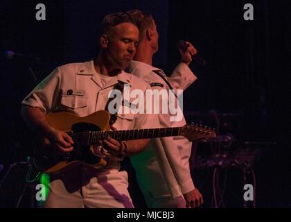180501-N-FV739-086  TRINCOMALEE, Sri Lanka (May 1, 2018) - Chief Musician Andrew Conover, native of Richmond, Va., and Musician 3rd Class Brenton Mitchell, native of Centreville, Md., assigned to Military Sealift Command hospital ship USNS Mercy (T-AH 19), play during a U.S. Pacific Fleet Band performance at Naval Dockyard Trincomalee. Mercy is deployed in support of Pacific Partnership 2018 (PP18). PP18’s mission is to work collectively with host and partner nations to enhance regional interoperability and disaster response capabilities, increased stability and security in the region, and fos Stock Photo