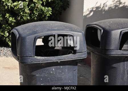SAN DIEGO/CALIFORNIA, AUGUST 18, 2017: Black plastic trash cans of Toter company on the beach of Coronado Peninsula. Stock Photo
