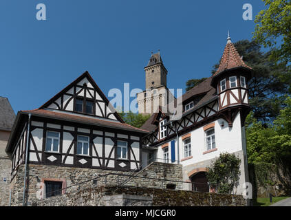 View on half timbered houses and castle tower in the historic old town of Kronberg im Taunus, Hesse, Germany