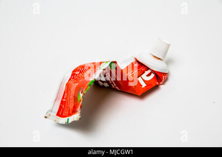 Use tooth paste tube in white background Stock Photo