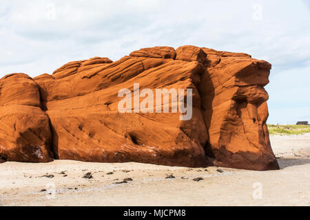 Red cliffs on the south dune on the Magdalen Island of 'Cap-aux-Meules' in Canada Stock Photo