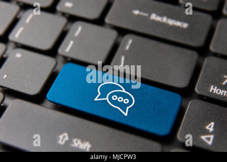 Social media chat keyboard button for live conversation concept. Talking bubbles icon key in blue color. Stock Photo