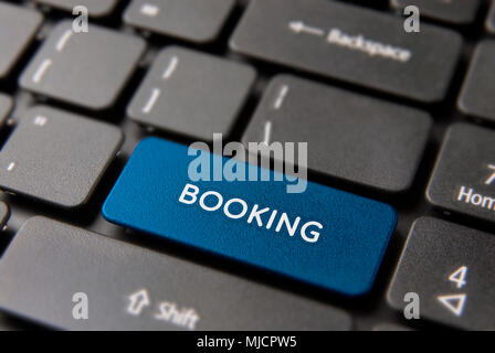 Business booking button for online holiday reservation concept. Book hotel icon in blue color. Stock Photo