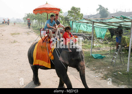 U.S. Army Soldiers with 2nd Infantry Brigade Combat Team, 25th Infantry Division enjoy an elephant ride as part of the cultural morale day Feb. 15, 2018 during Exercise Cobra Gold 18 in Bangkok, Thailand. Cobra Gold 18 provides a venue for the United States and Thailand, along with allied and partner nations to advance interoperability and increase partner capacity in planning and executing complex and realistic multinational force and combined task force operations. Cobra Gold 18 is an annual exercise conducted in the Kingdom of Thailand held from Feb. 13-23 with seven full participating nati Stock Photo