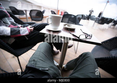Passengers in the cafe are waiting for ferry, close-up, detail Stock Photo