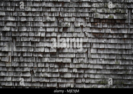 old shingles, grey and weathered on a wooden house in the Black Forest, detail Stock Photo