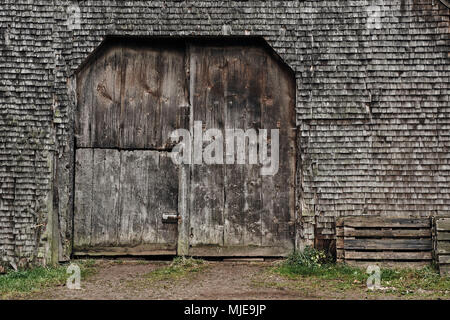 old shingles and gate, grey and weathered on a wooden house in the Black Forest, detail Stock Photo