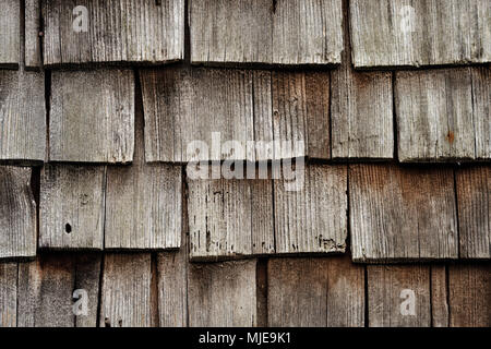 old shingles, grey and weathered on a wooden house in the Black Forest, detail Stock Photo