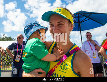 GOLD COAST, AUSTRALIA - APRIL 8: Claire Tallent of Australia with her baby son after the Women's 20k Walk at the Gold Coast 2018 Commonwealth Games at Stock Photo