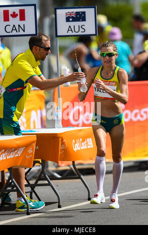 GOLD COAST, AUSTRALIA - APRIL 8: Claire Tallent of Australia grabbing some water in the Women's 20k Walk at the Gold Coast 2018 Commonwealth Games at  Stock Photo