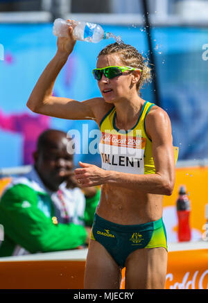 GOLD COAST, AUSTRALIA - APRIL 8: Claire Tallent of Australia grabbing some water in the Women's 20k Walk at the Gold Coast 2018 Commonwealth Games at  Stock Photo