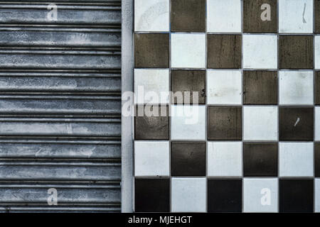 View of geometric shaped tile and corrugated steel. Stock Photo