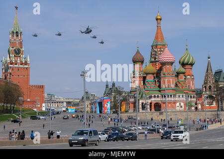 Moscow, Russia. 4th May, 2018. Russian Air Force A Mil Mi-26 heavy transport helicopter and Mil Mi-8 combat helicopters fly in formation during a rehearsal of the upcoming Victory Day air show marking the 73rd anniversary of the victory over Nazi Germany in the 1941-45 Great Patriotic War, the Eastern Front of World War II. Credit: Victor Vytolskiy/Alamy Live News Stock Photo