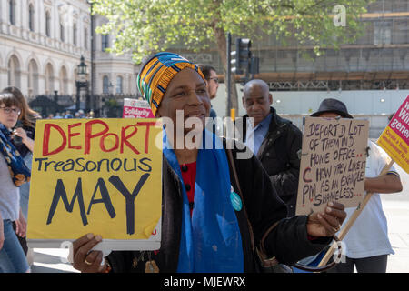 London, UK, 5th May 2018, Demonstrators attend a march for Windrush opposite Downing Street in an attempt to overturn the governments immigration policy stating Theresa May's current policy is racist. Credit: adrian looby/Alamy Live News