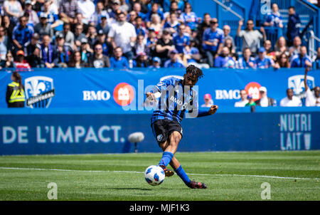 Montreal, Canada. 5 May, 2018. Montreal Impact midfielder Raheem Edwards (14) scores a goal at the 65 minute of the 2018 Major League Soccer regular season match between the Montreal Impact and the New England Revolution, at Stade Saputo. Credit: Pablo A. Ortiz / Alamy News Live Stock Photo