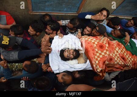 Srinagar, Jammu & Kashmir, India, May 5, 2018.  (EDITORS NOTE: Image depicts death.).People carrying body of militant Fayaz Ahmed Hamal at his residence Khankah Area of Srinagar Summer Capital Of Indian Kashmir on Saturday for burial.Multiple Funeral processions held in srinagar summer capital of Indian Kashmir on Saturday of Fayaz Ahmed Hamal a LeT (Lashkar-e-Taiba) Militant and a Civilian Adil Ahmed Yatoo who were killed by armoured vehicle on Saturday during clashes near Encounter site. Credit: ZUMA Press, Inc./Alamy Live News Stock Photo