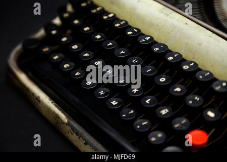 Closeup view of a dirty and rusty typewriter keyboard. Stock Photo
