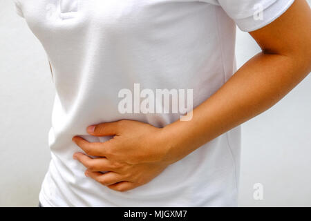 Woman Suffering From Stomach Ache Stock Photo