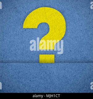 question mark symbols on blue paper texture Stock Photo