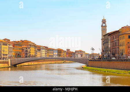 Ponte di Mezzo (Mezzo Bridge) on Arno river with Pisa cityscape in the background in Tuscany, Italy Stock Photo