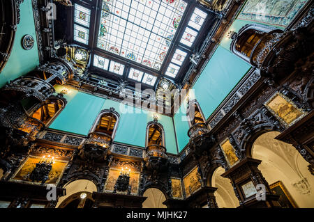 Hall of Honour (Holul de Onoare) and glass ceiling in Peles Palace, former royal castle, built between 1873 and 1914, located near Sinaia in Romania Stock Photo