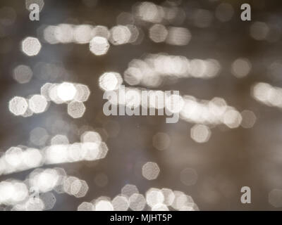 Background. Texture. Blurry light spots, bokeh. Light reflection on the water. Stock Photo
