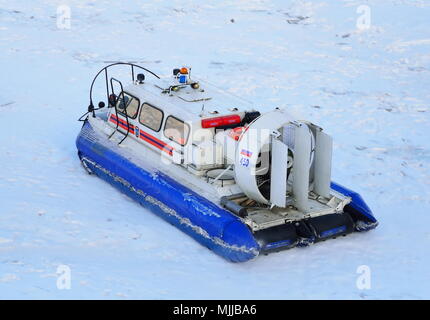 ST.PETERSBURG, RUSSIA - MARCH 07, 2018:  The boat of the rescuers on the ice in winter in Saint-Petersburg Stock Photo