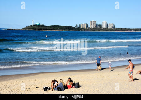 CROWDS OF PEOPLE ENJOYING BEAUTIFUL MOOLOOLABA BEACH IN QUEENSLAND AUSTRALIA Stock Photo